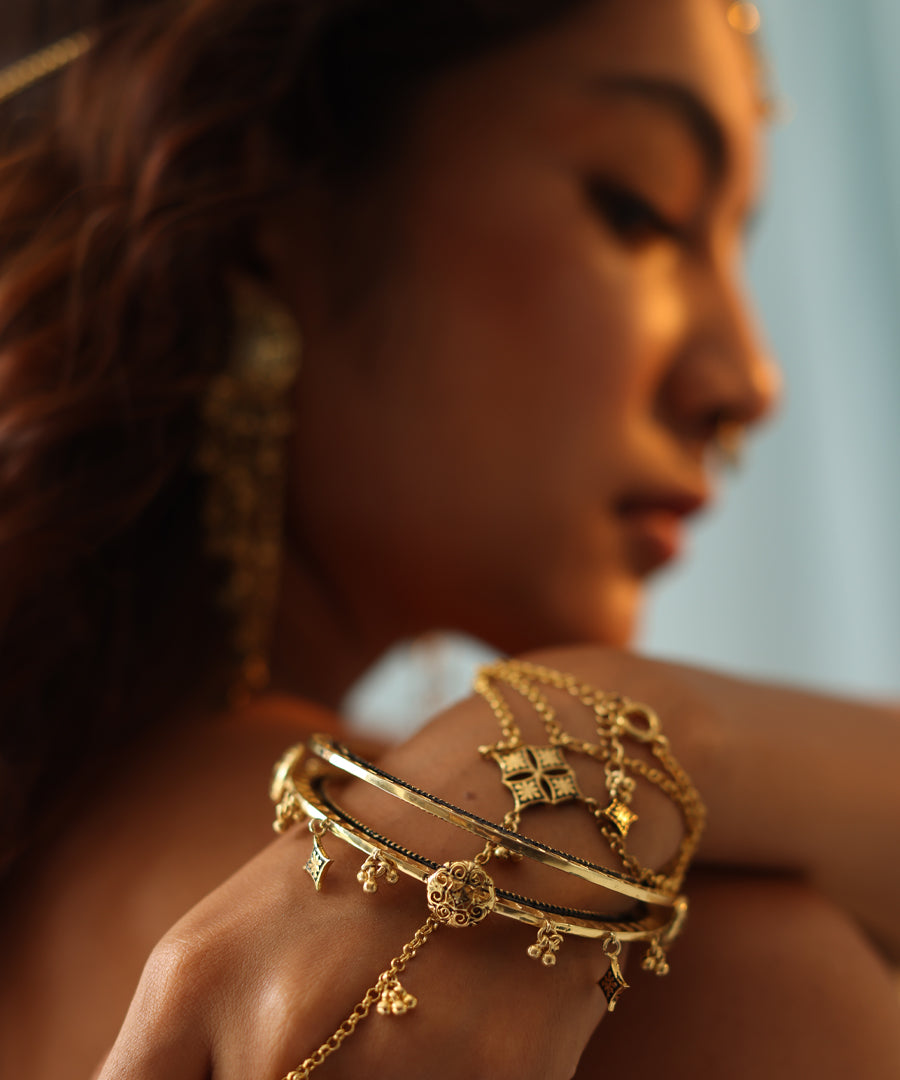 Handcrafted in silver gold plated bangles.