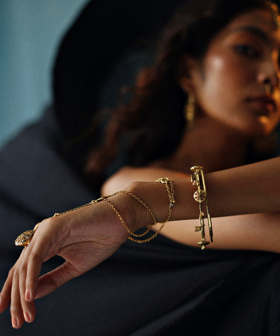 Model wearing hand accessories from scent of thar collection by manner.