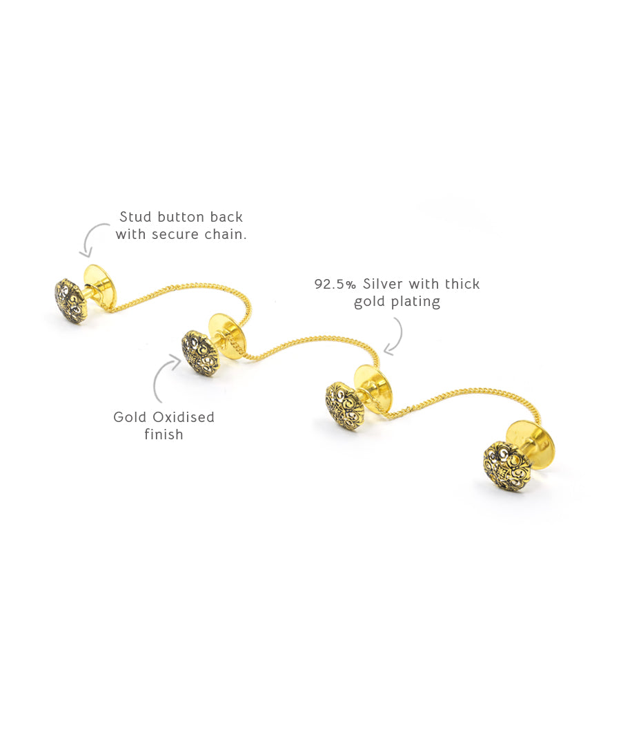 Stud button back with secure chain.