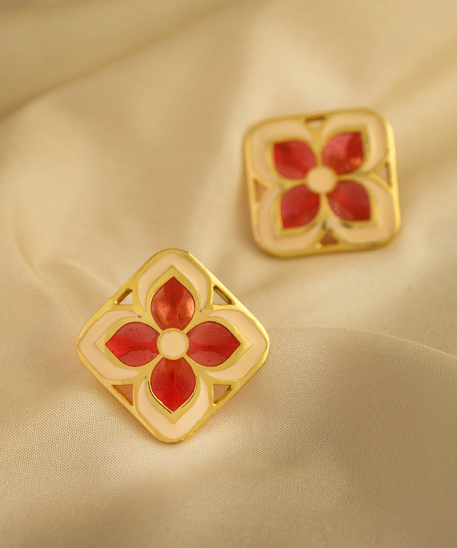 Red Chameli earrings. 92.5% sterling silver gold plated earrings from AKS collection by Manner India.