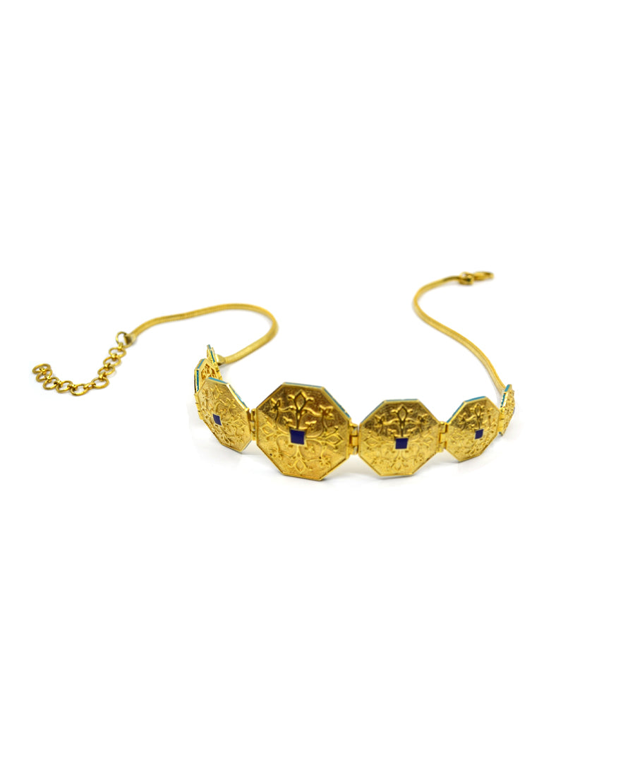Gold plated choker necklace.
