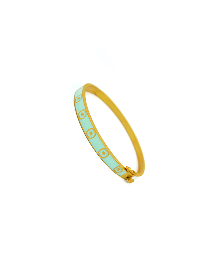 Gold plated bracelet with open lock mechanism.