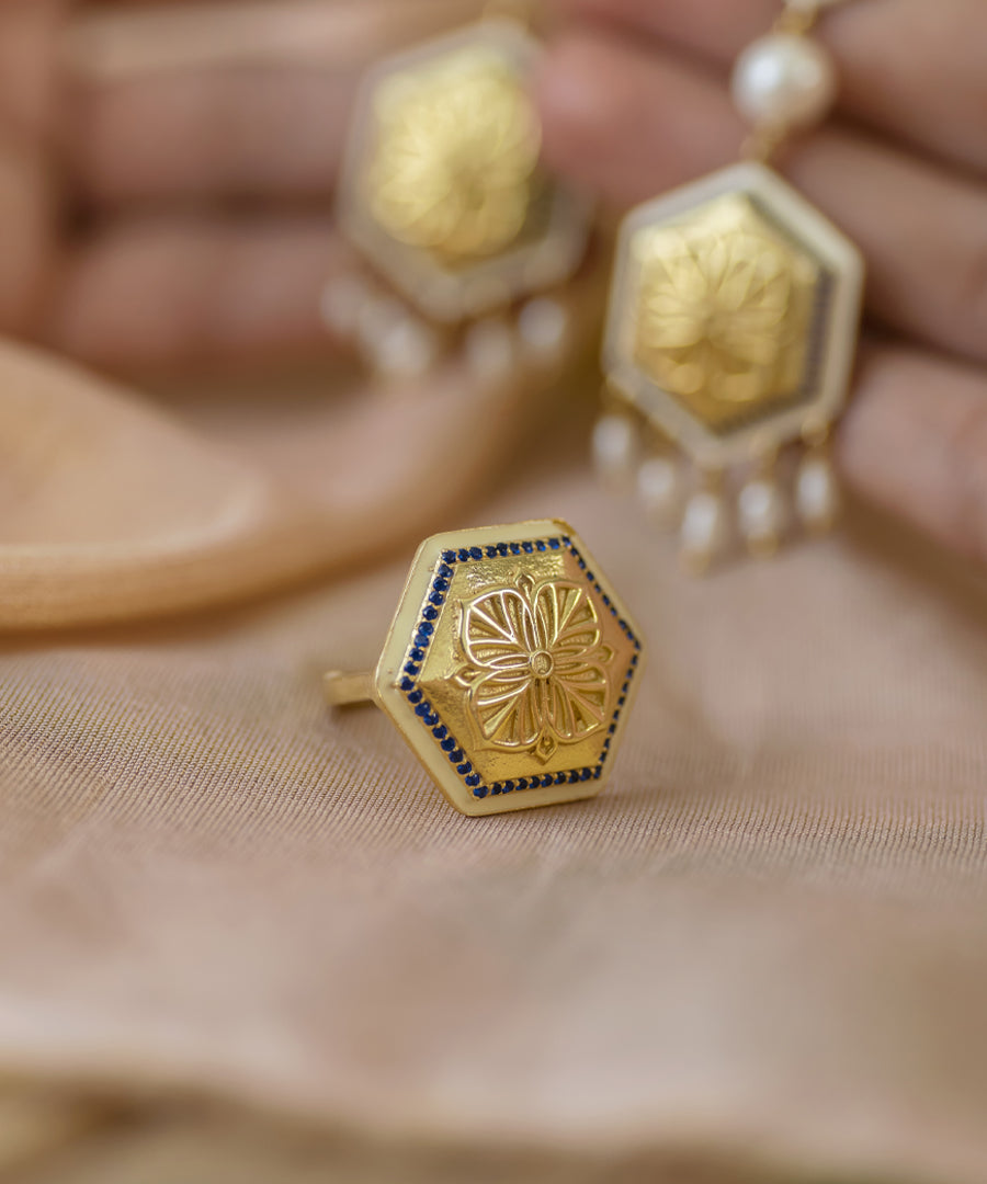 925 Silver Ring with thick gold plating adorn with zircons along the border.
