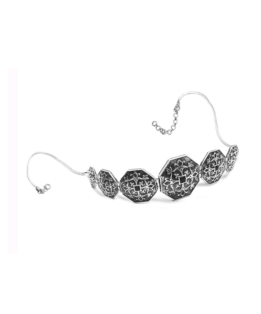 Silver oxidised choker necklace by manner india.