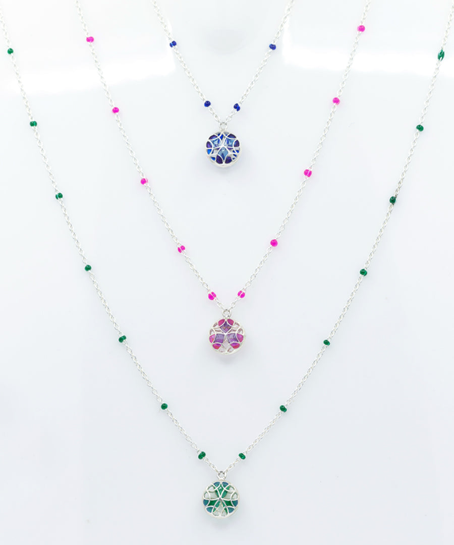 Tarnishfree charm necklace with transparent enamel work handmade and crafted in 925 silver.