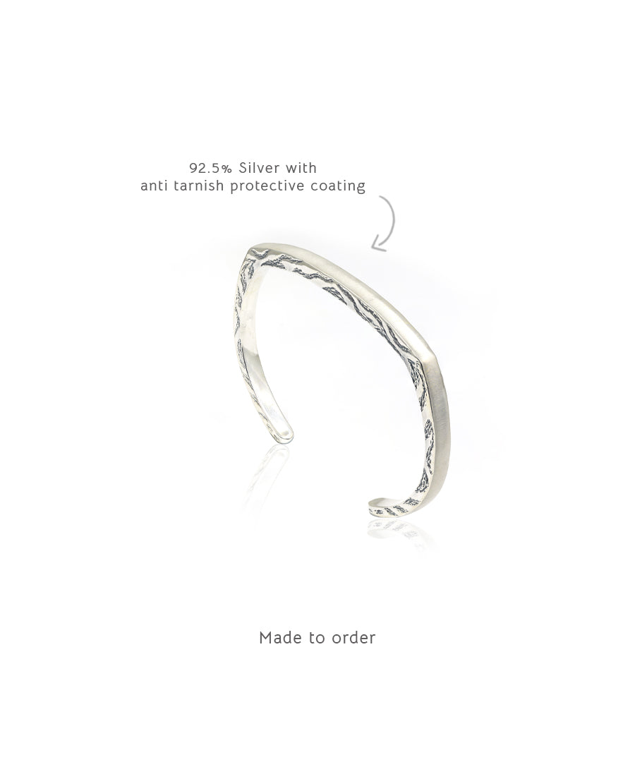 Silver tarnishfree open ended cuff bracelet.