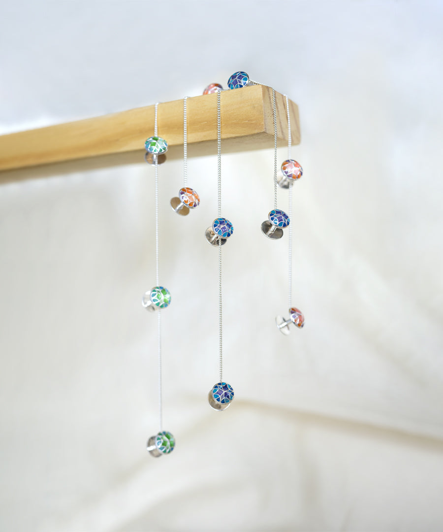 A set of 4 kurta buttons with secure chain.