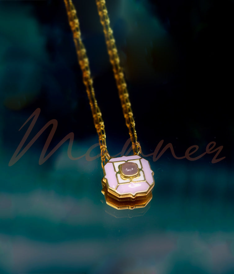 Enameled long chain necklace with rose quartz gemstone.