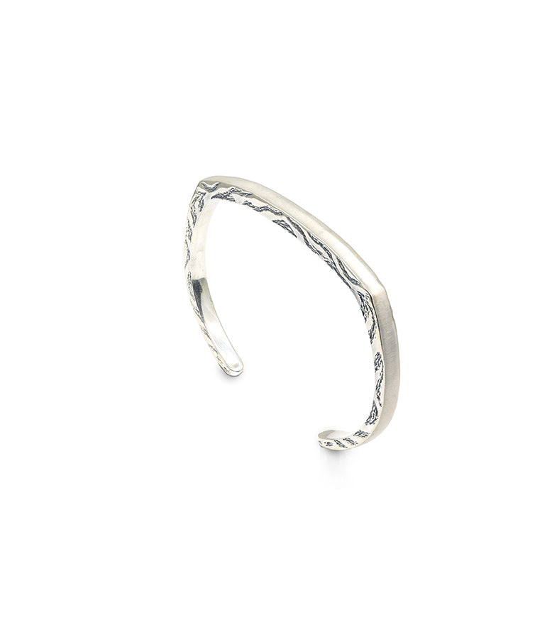Silver open bracelet.
