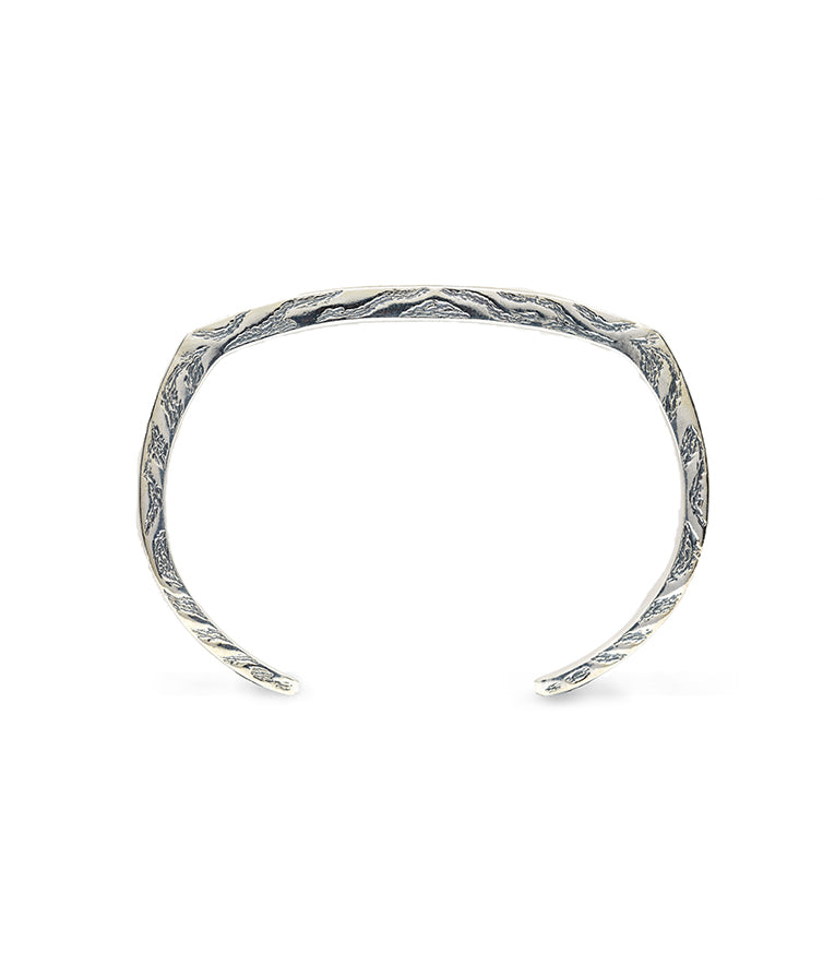 Side carved designer open ended bracelet for men.