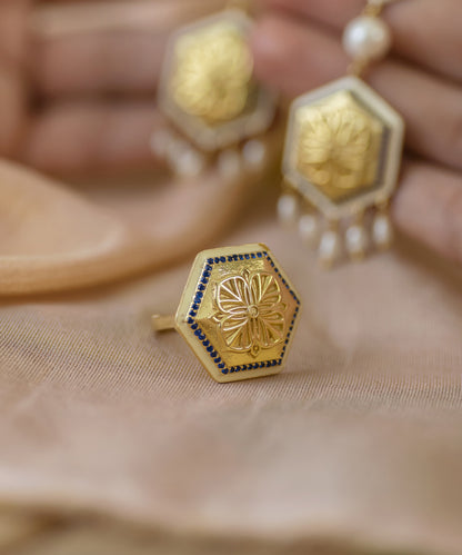 925 Silver Ring with thick gold plating adorn with zircons along the border.