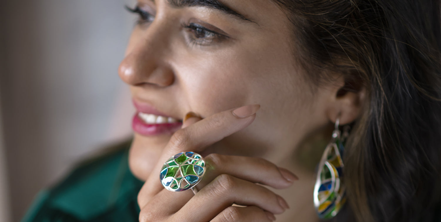 Founder and designer wearing manner ring
